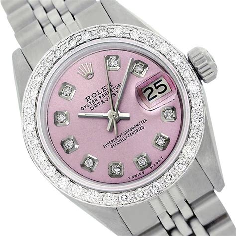 pink rolex watch with diamonds.